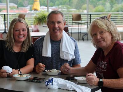 Members of health and wellness enjoy a sundae
