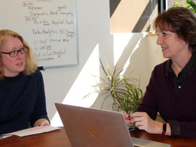 Associate Vice President of Student and Faculty Development Kathleen Casey meets with Physical and Life Sciences Department Chair and Associate Professor Kathryn Link.