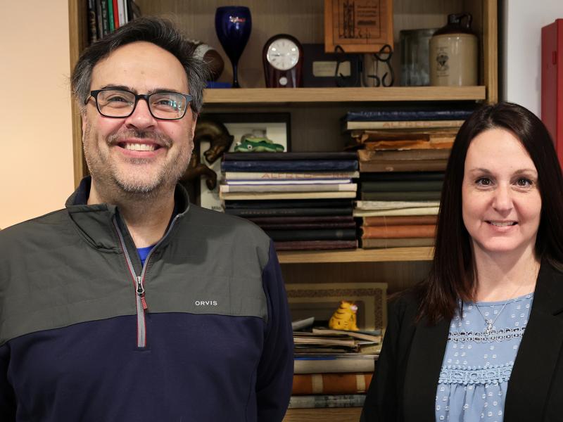 John Lewis and Sandy Burdick in the alumni house