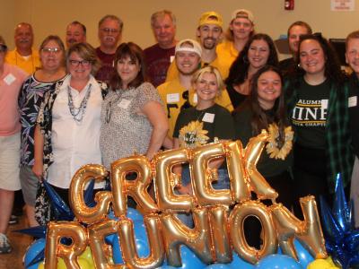 Little brothers and little sisters gathered for a photo during the Alfred State All Greek Reunion.