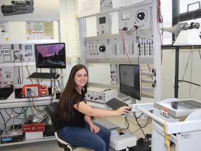 Margaret Shepard (Hornell) works in an electrical engineering laboratory.