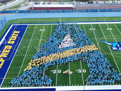 Alfred State students along with faculty and staff form their first A.