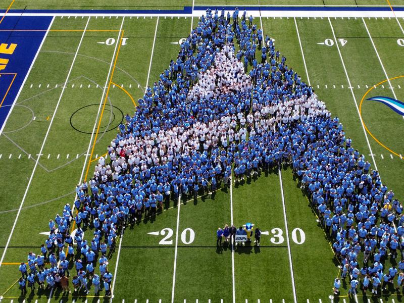 Student make an A on the football field