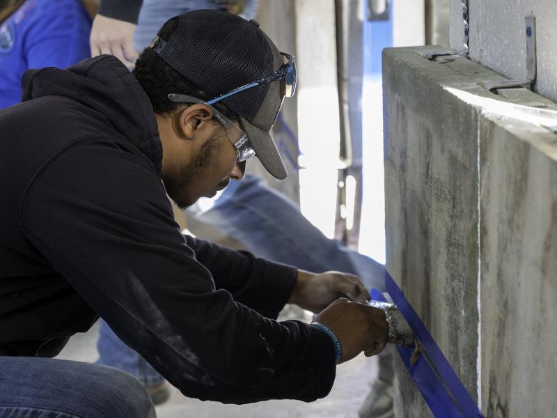 student works on a project in the masonry lab