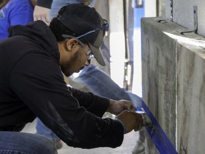 student works on a project in the masonry lab