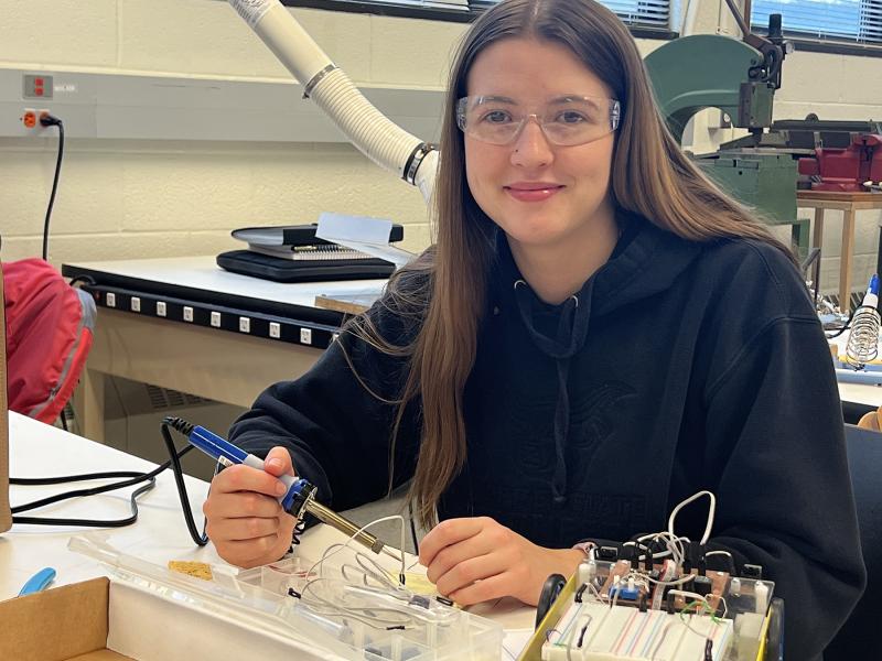 student working in a mechatronic lab