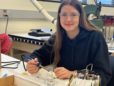 student working in a mechatronic lab