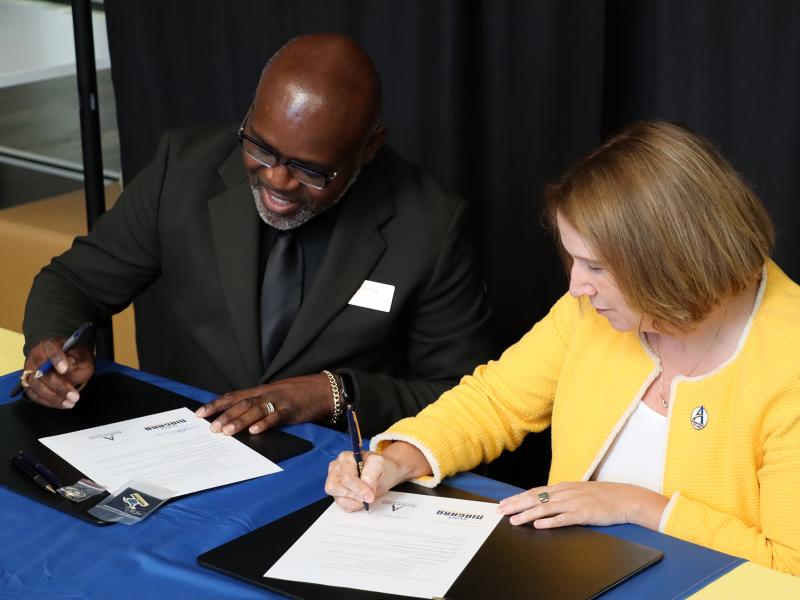 Leaders sign a new articulation agreement