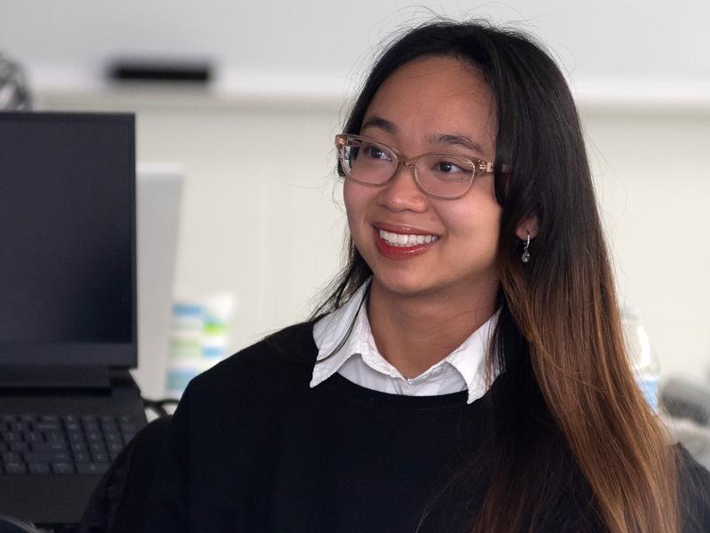 Vina Pham sits in a class