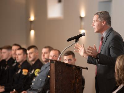 Dr. Mauro congratulates the 2023 graduates of the Police Academy