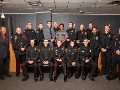 The Alfred State Police Academy pictured along with the Academy administration at the graduation ceremonies for the 2022 class.