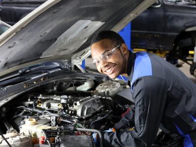 Student works on a car