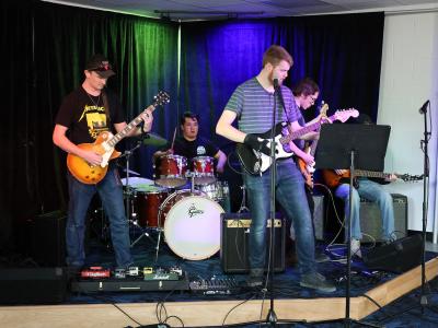 Students practice in the new Rock Band room