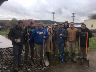 SkillsUSA Club group installing footers for music notes