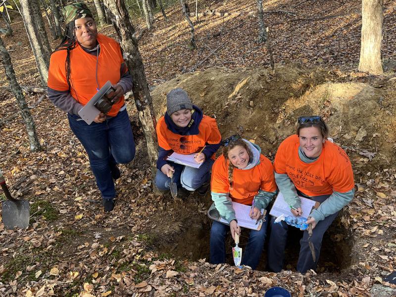 students compete in a soil competition