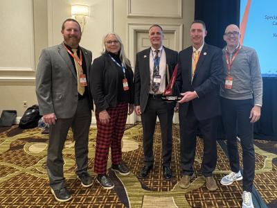 Alfred State administration accepts award