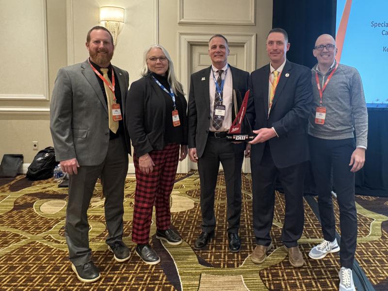 Alfred State administration accepts award