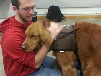 Student with therapy dog