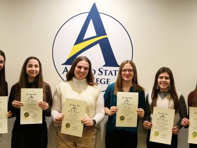 students inducted into Tau Sigma Delta 