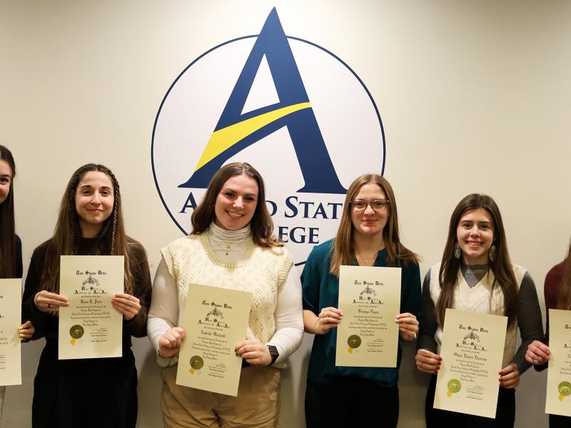 students inducted into Tau Sigma Delta 