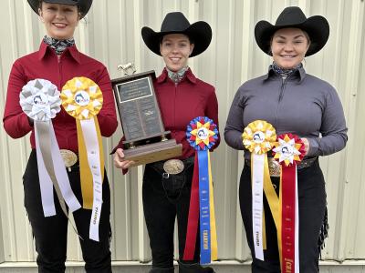 Alfred State riders Jessalyn Corson, Mikenna Riethmiller, and Molly Arnold show off their awards from the IHSA Western Regionals.