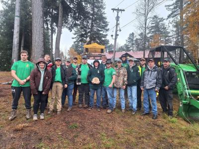 The woodsmen team poses after a successful competition at Paul Smith’s College.