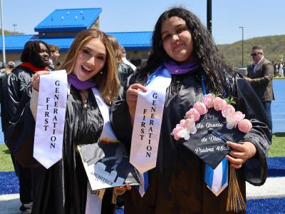 pair of first generation students at commencement