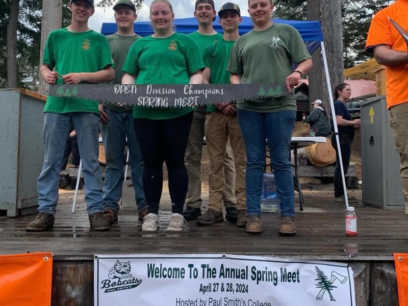 Alfred State woodsmen team with their trophy