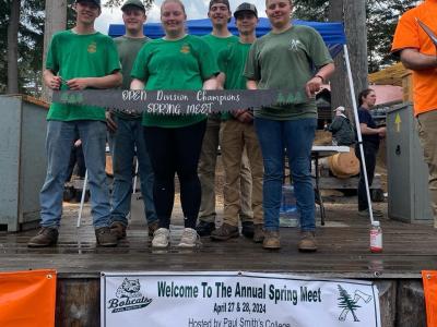 Alfred State woodsmen team with their trophy
