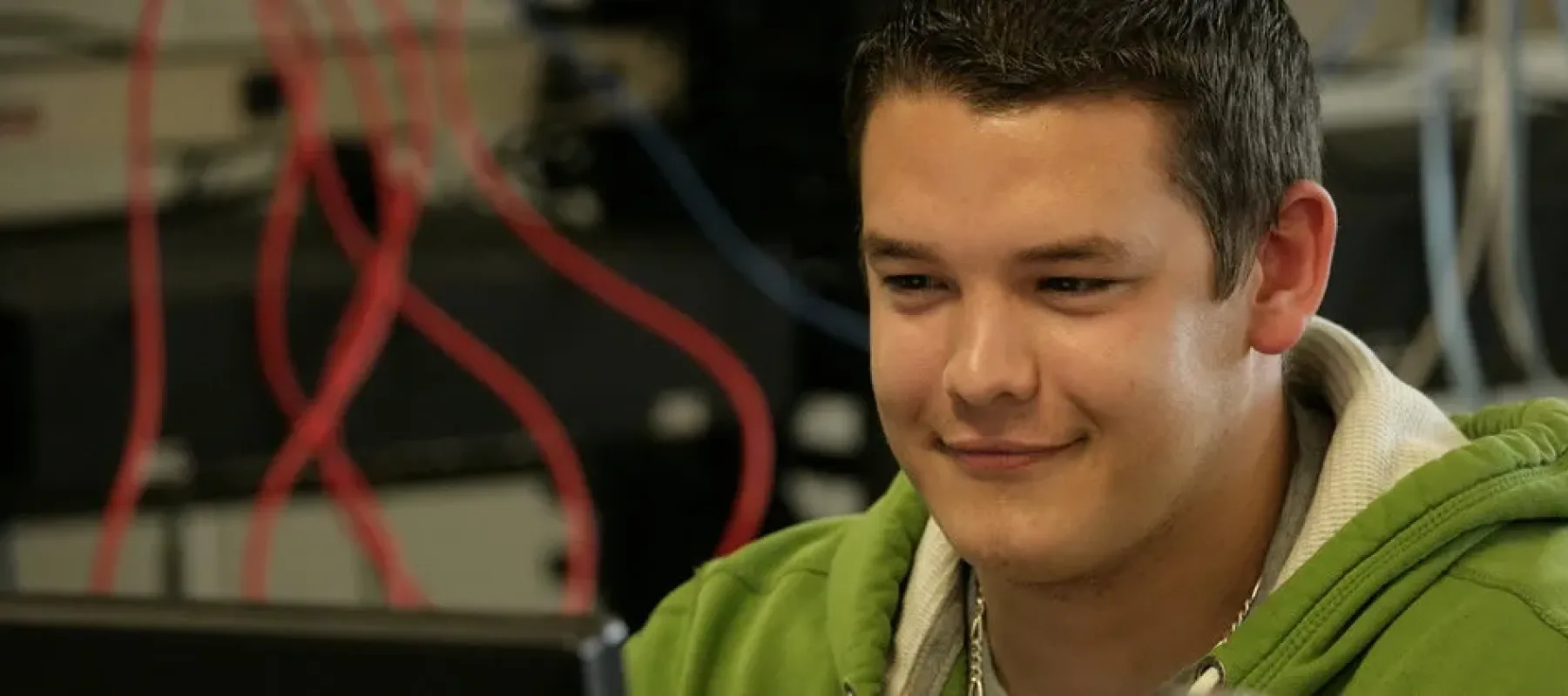 IT student working on computer.