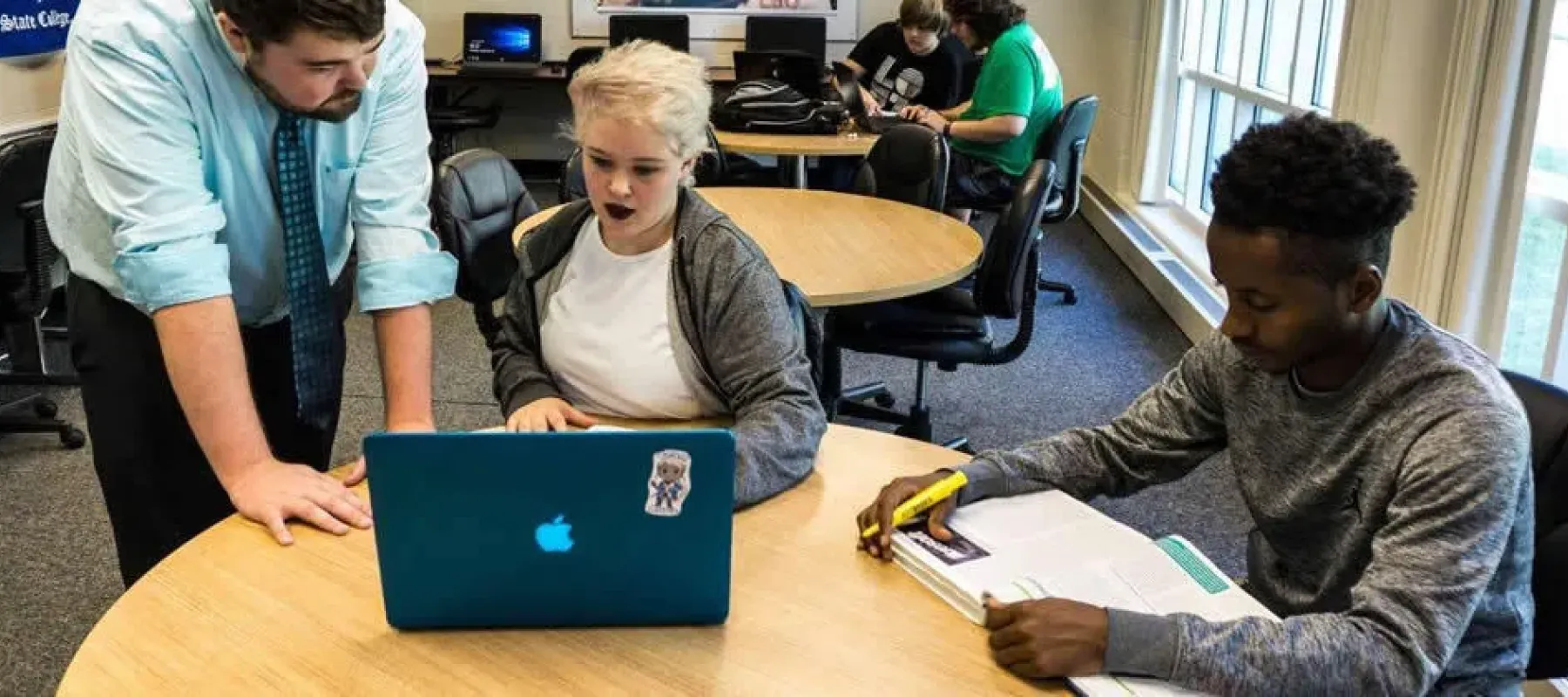 Students getting help in the academic advising center.