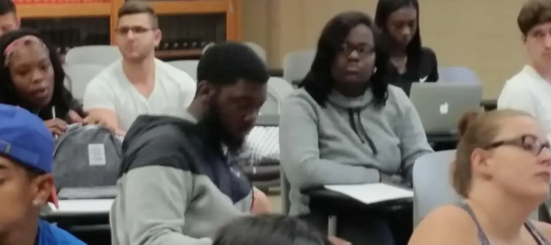 Students sitting at desks in a classroom.