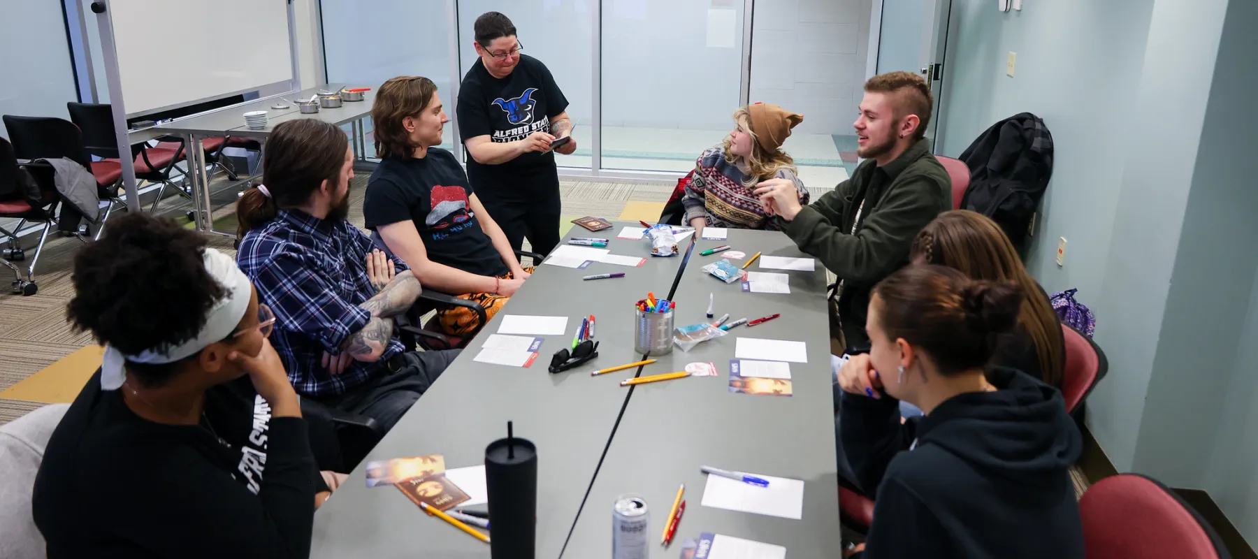 Students sitting together at a table.