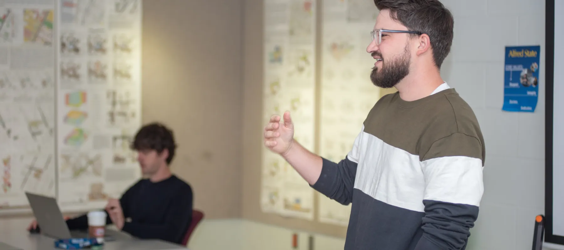 Architecture student answering question in classroom.