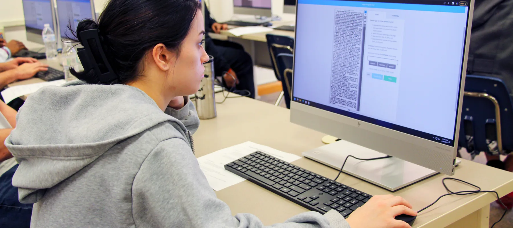 A student coding on a computer