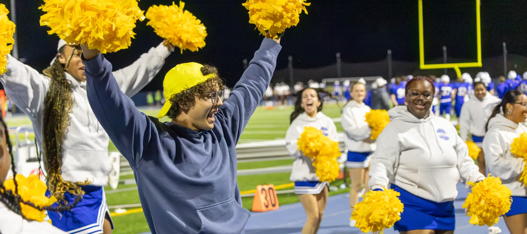 Alfred States cheerleaders at Homecoming.