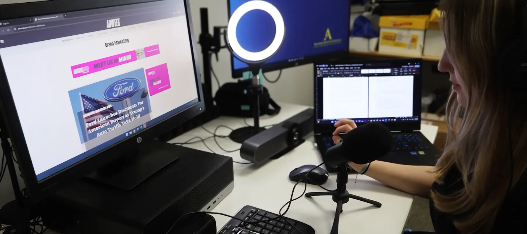 Marketing student working on a computer.