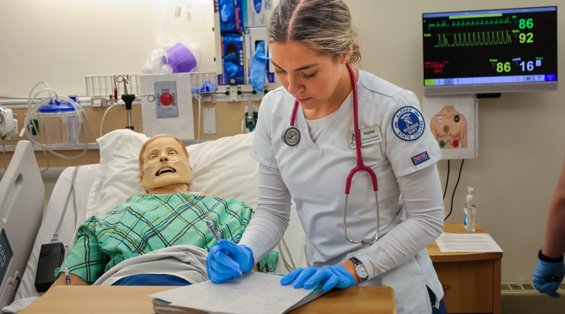 A nursing student in a simulation lab.