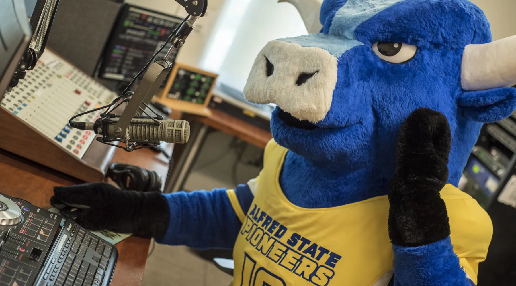 Alfred State's mascot hosting a radio show.