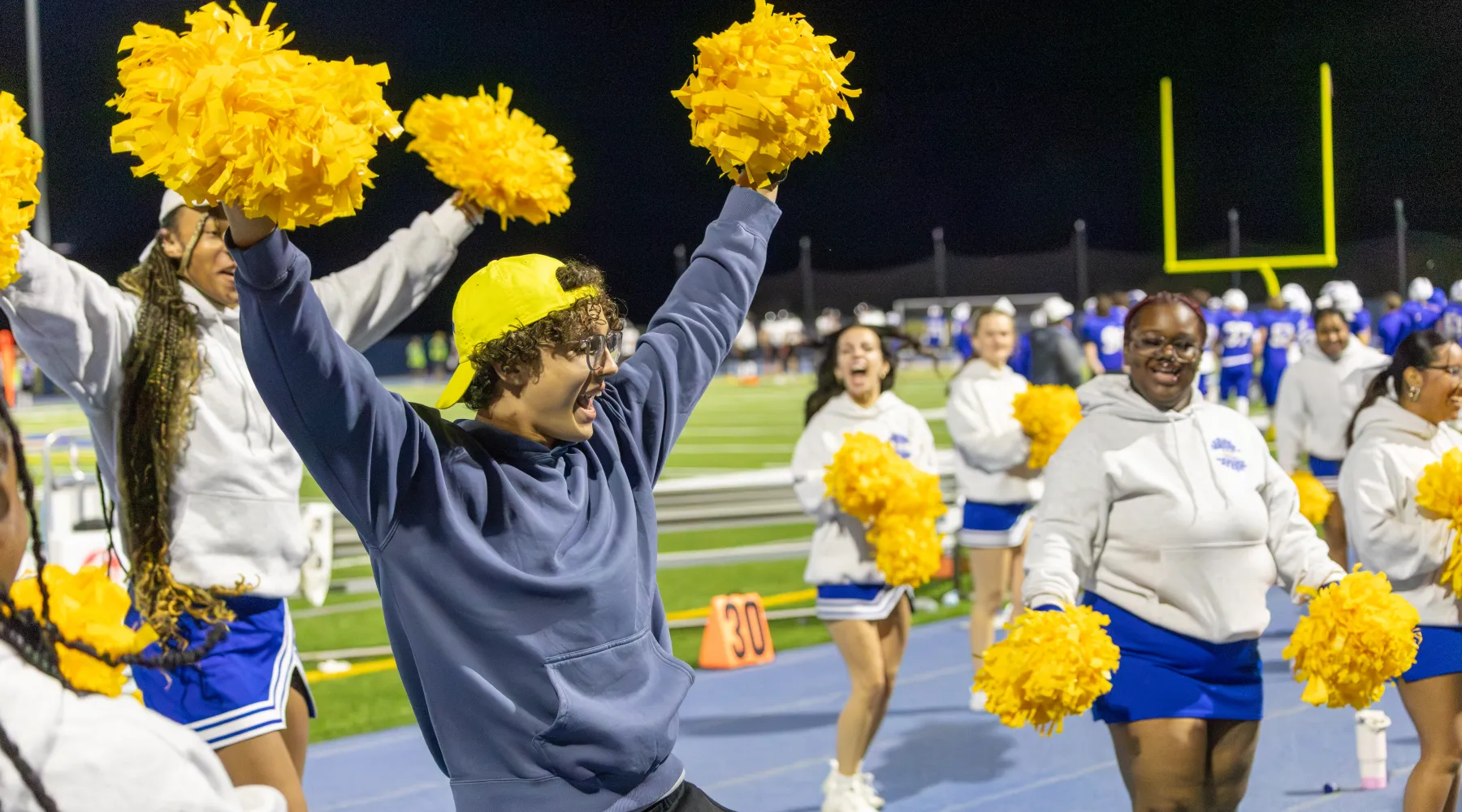 Alfred States cheerleaders at Homecoming.