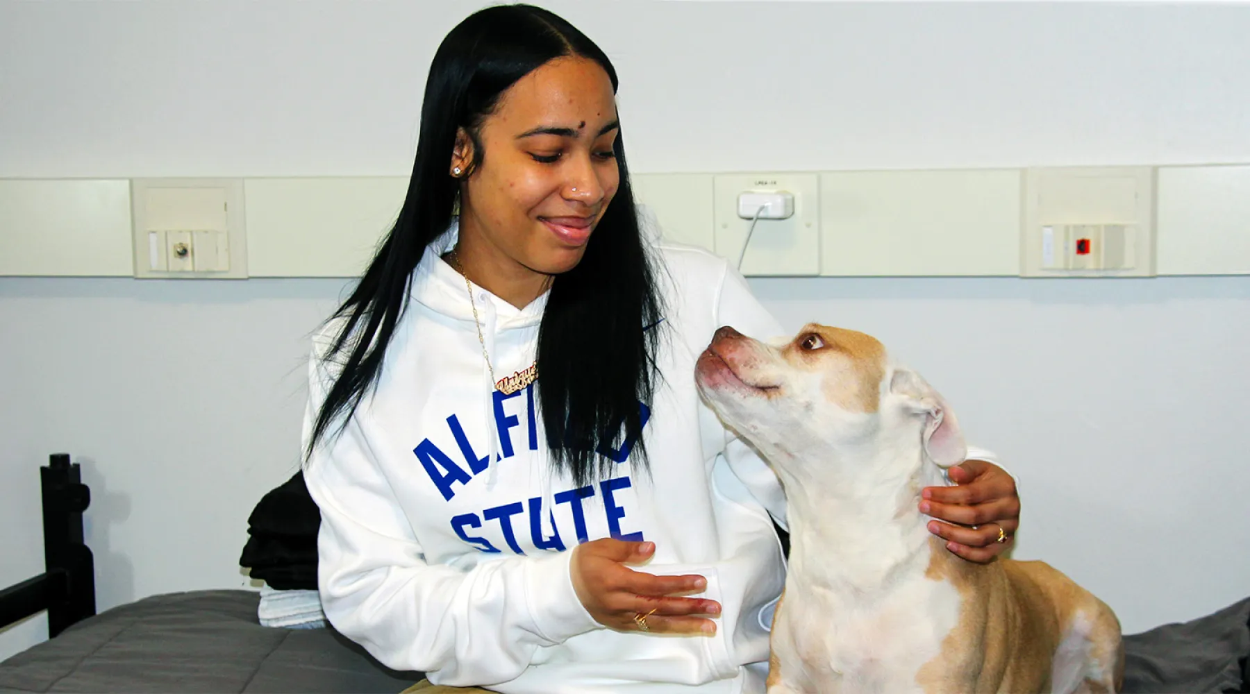 ASC student with her dog on campus.